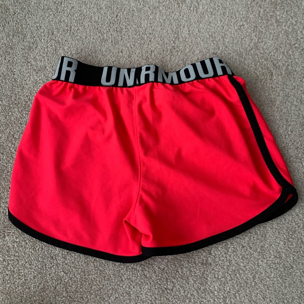Under armour Pink shorts that are size youth 12-14